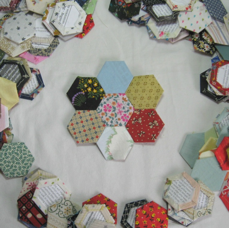start off with a cluster of seven hexagons