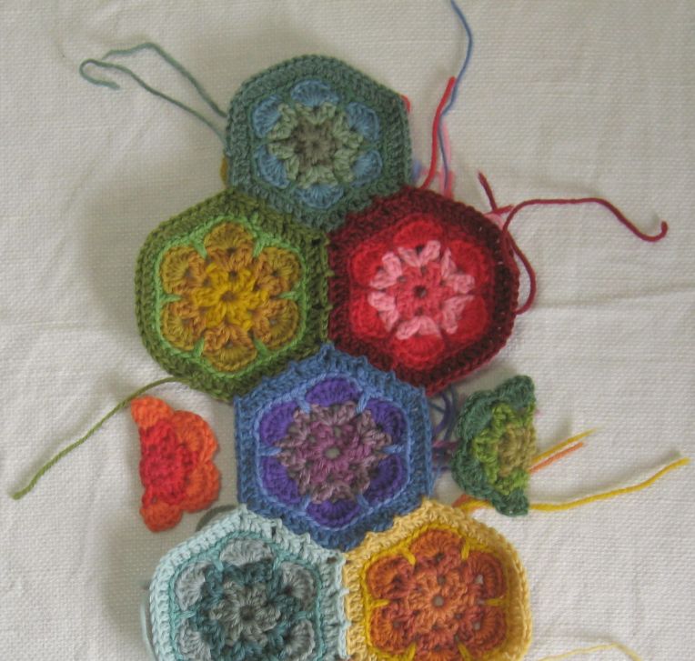 crocheted half hexagons fill in the side gaps
